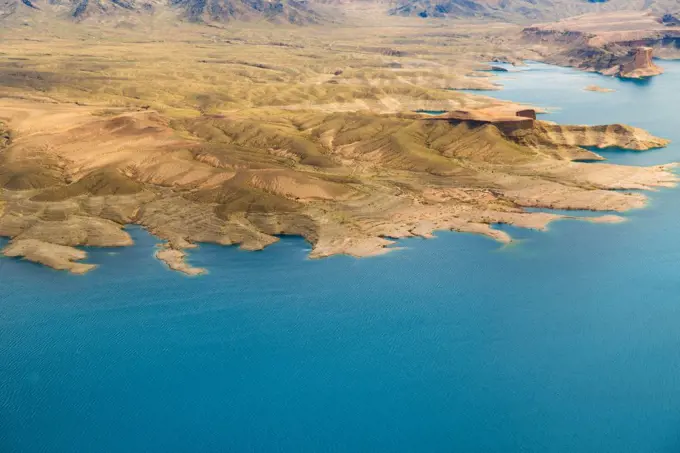 landscape and nature concept - aerial view of grand canyon and lake mead from helicopter. aerial view of grand canyon and lake mead