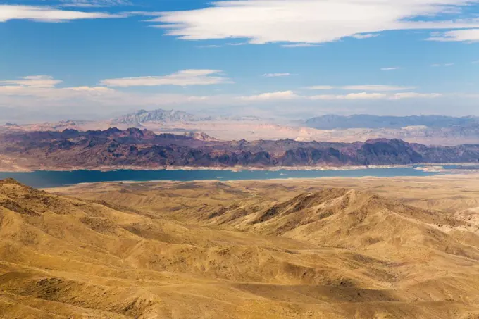 landscape and nature concept - aerial view of grand canyon and lake mead from helicopter. aerial view of grand canyon and lake mead