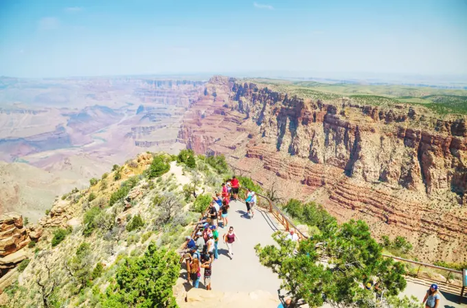 GRAND CANYON VILLAGE, AZ - AUGUST 20: Crowded with people Desert View Watchtower point at the Grand Canyon National park on August 20, 2015 in Grand Canyon Village, AZ.