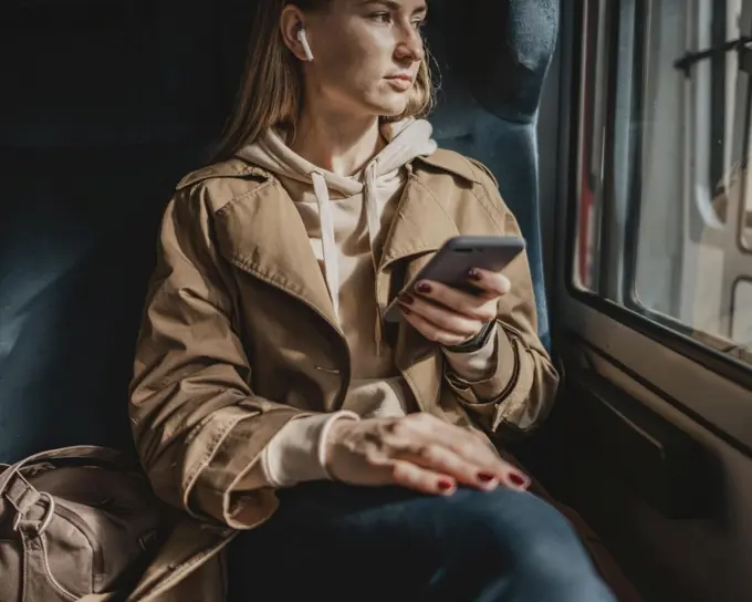 front view female passenger listening music