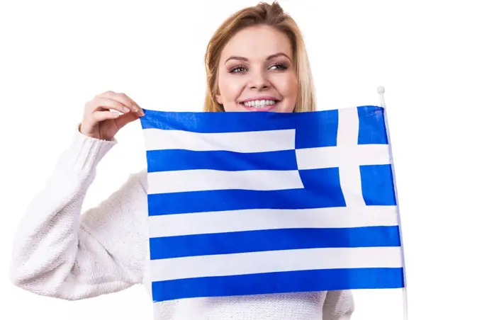 Happy funny woman holding Greece greek national flag being patriotic loving her country.. Happy woman holding Greek national flag