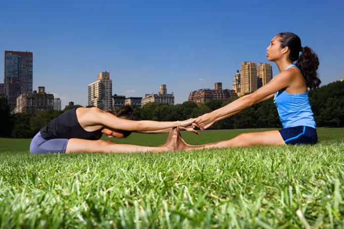 Female athletes stretching