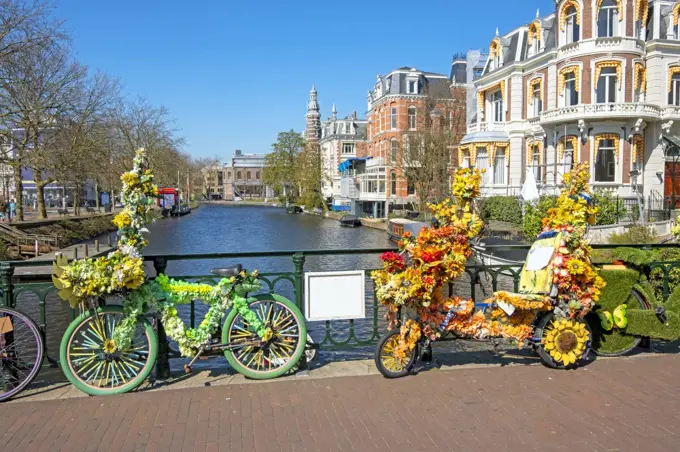 Bikes decorated with flowers in Amsterdam the Netherlands in spring