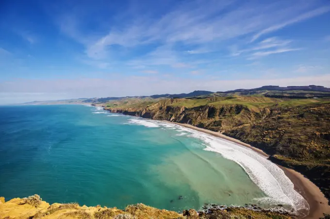 Beautiful Sunset at the Ocean Beach, New Zealand. Inspiring natural and travel background