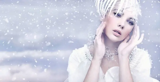 Beauty woman over winter background