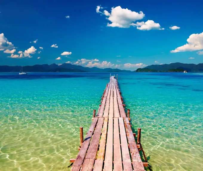 Wooden pier in tropical paradise, Thailand