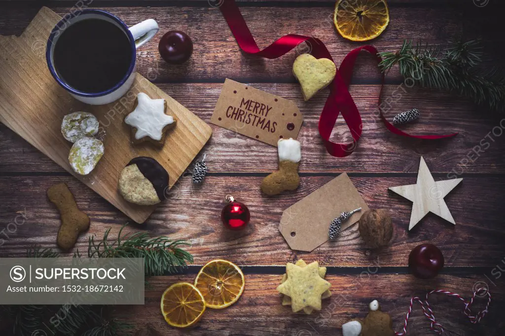 Christmas arrangement of biscuits, coffee and decorations