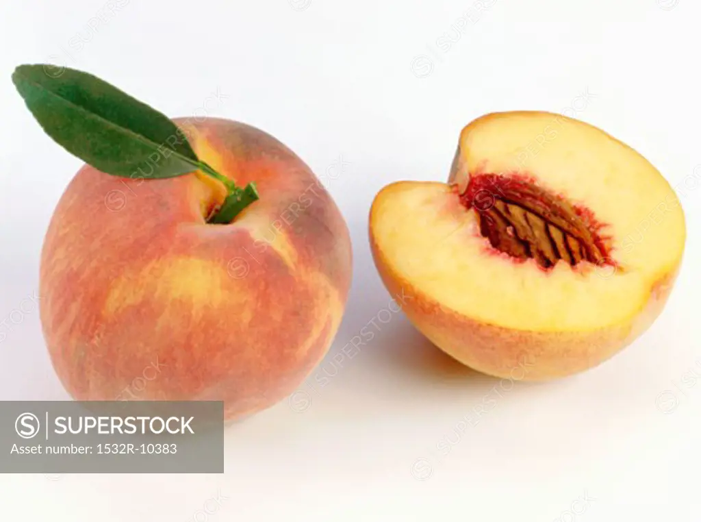 One half and one whole peach