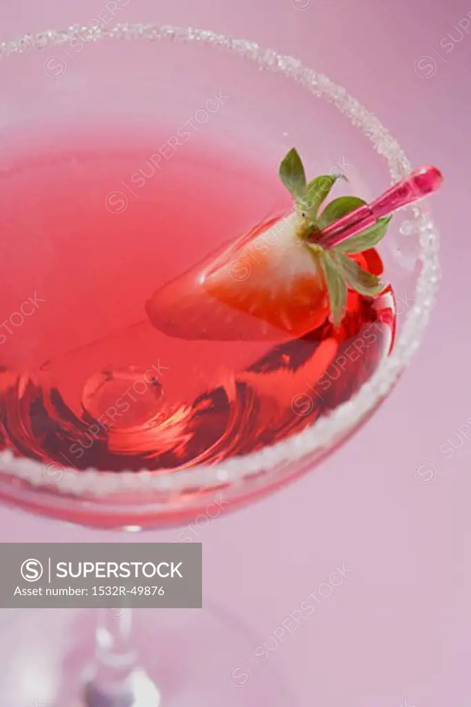 Martini with liqueur & strawberry in glass with sugared rim