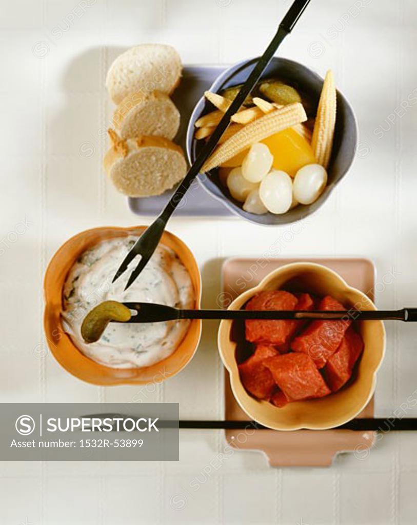 Fondue Bourguignonne - SuperStock