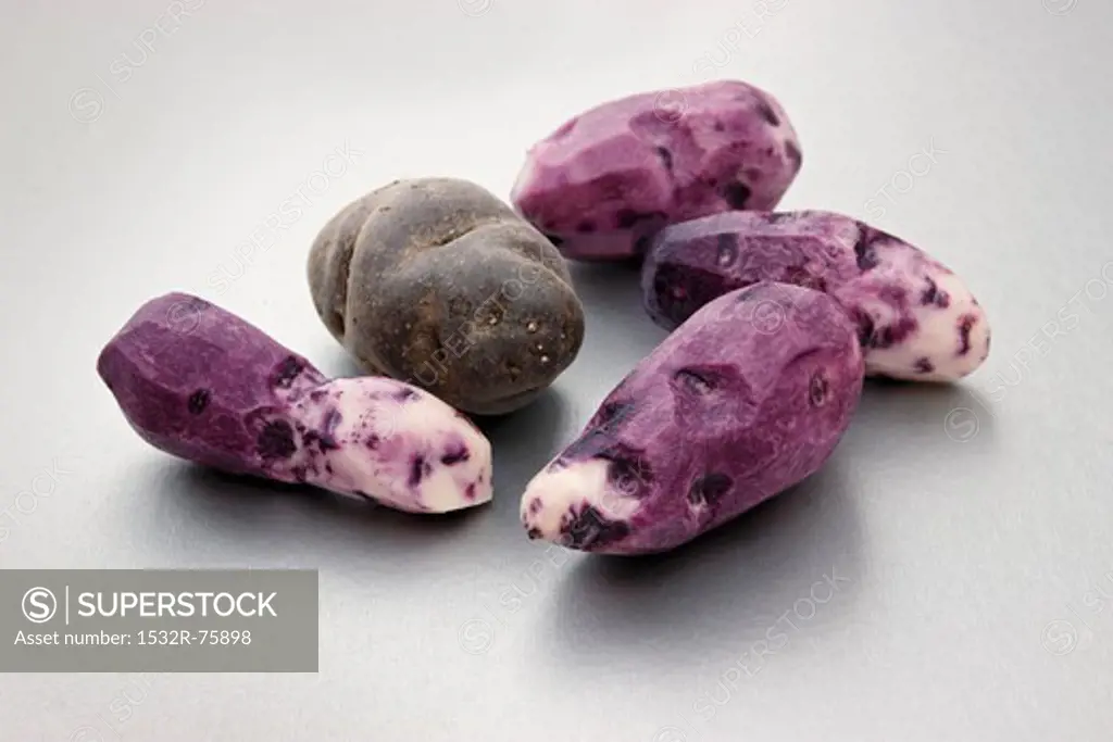 Purple Vitelotte potatoes, peeled and unpeeled, 10/24/2013