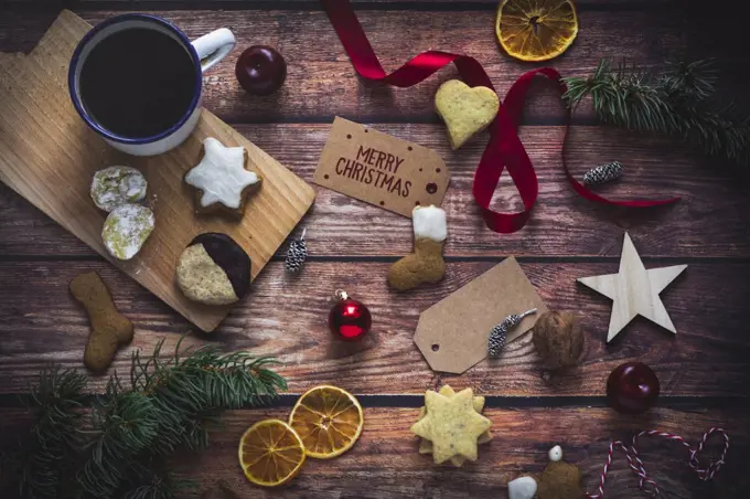 Christmas arrangement of biscuits, coffee and decorations