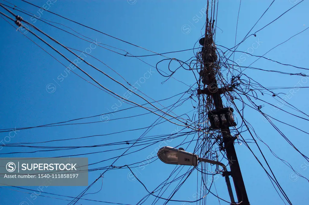 Electric pole ; Street light ; Complicated wiring on the poll ; Electrical connections from the Electric Street Light Poll ; Industry ; Electricity