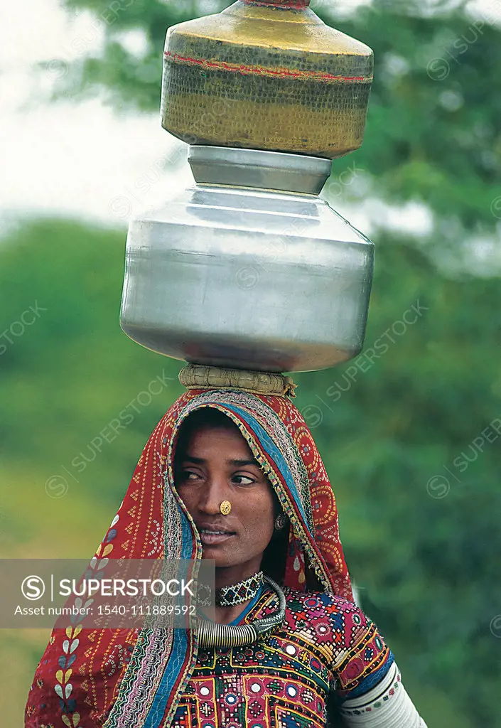 Trible Women Carring Water , Saurashtra , Kutch , Gujrat , India