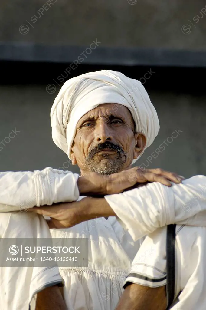 Rabari tribe old man wearing white turban ; Anjar ; Kutch ; Gujarat ; India