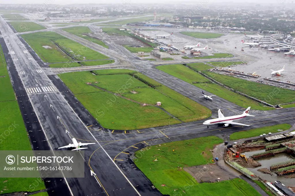 An aerial view runways and aircrafts at the Mumbai's Chhatrapati Shivaji Maharaj International airport at Sahar ; Bombay Mumbai ; Maharashtra ; India