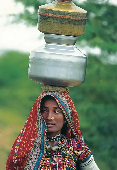 Trible Women Carring Water , Saurashtra , Kutch , Gujrat , India