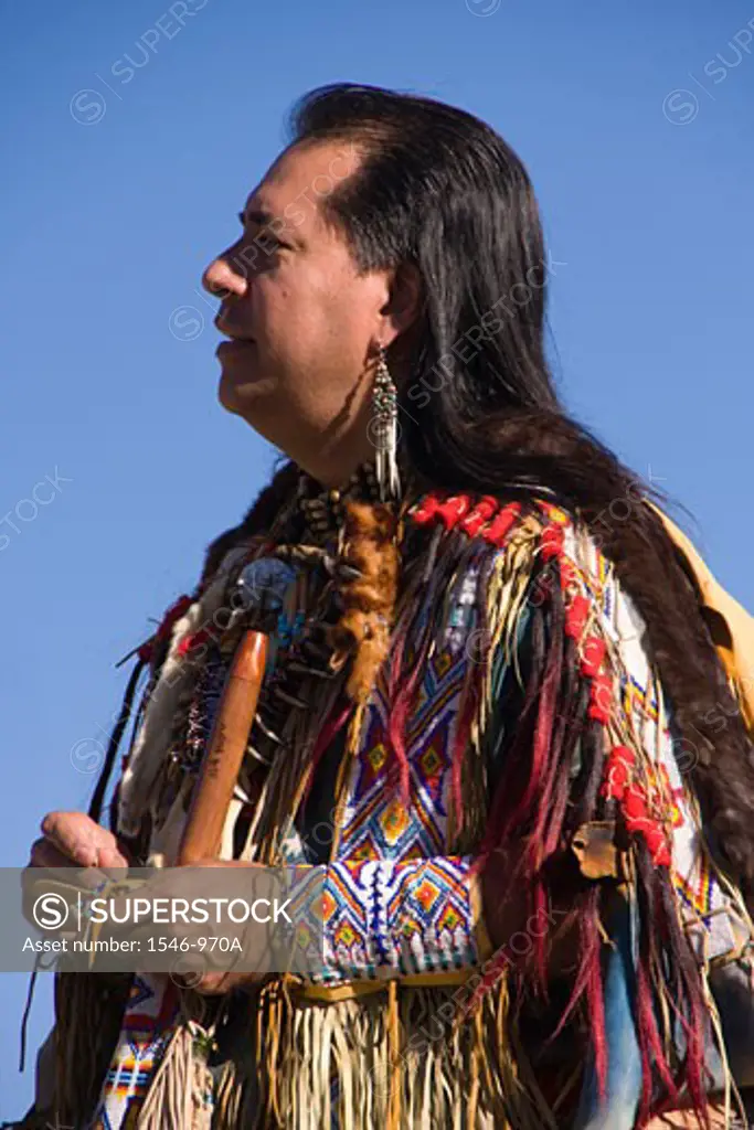 Lakota man in traditional clothing, Donner Summit, Truckee, California, USA