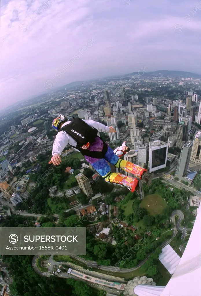 Person base jumping, KL Tower, Kuala Lumpur, Malaysia (fish-eye lens)