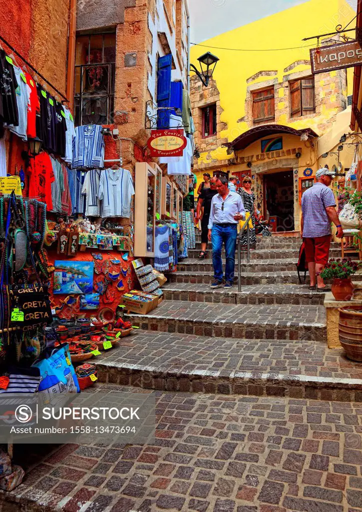 Crete, in the old town of Chania, business with clothing and souvenirs, tourists,