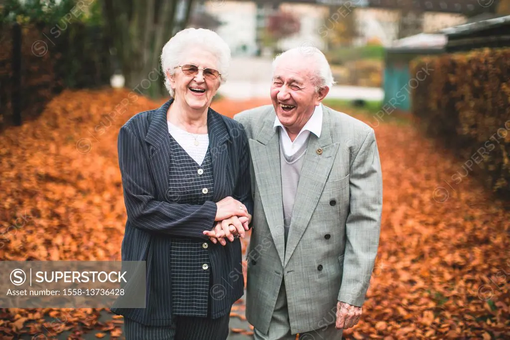 Senior couple in love at autumn walk