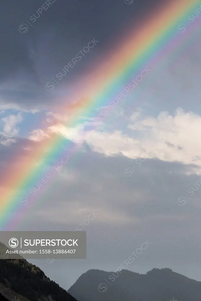 Rainbow in a summer storm - SuperStock