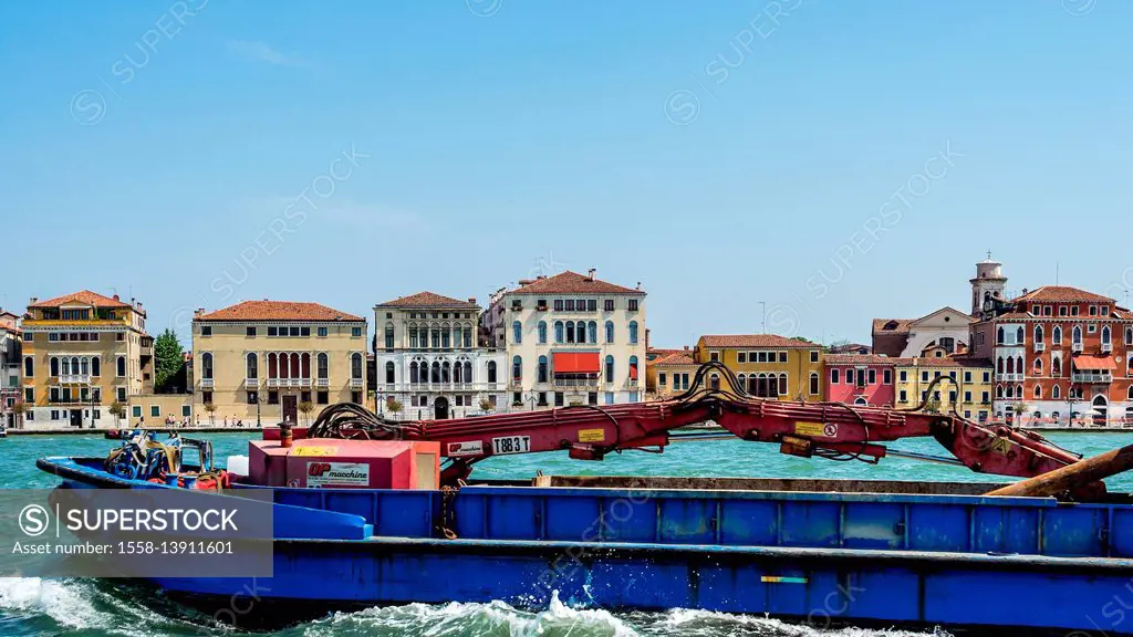 townscape with barge on channel, Venice, Veneto, Italy