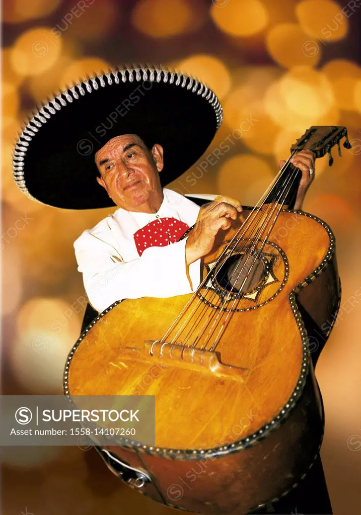 Mexican plays the guitar