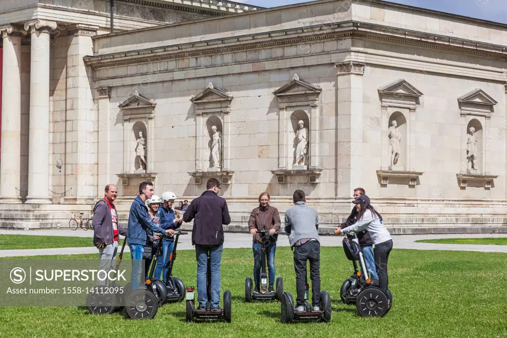 Germany, Bavaria, Munich, Glyptothek Museum and Tourists on Segways