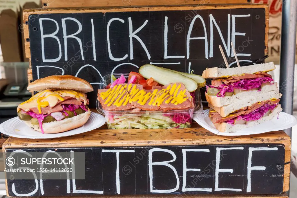 England, London, Shoreditch, Brick Lane, Street Food Stall Display of Salt Beef Sandwiches