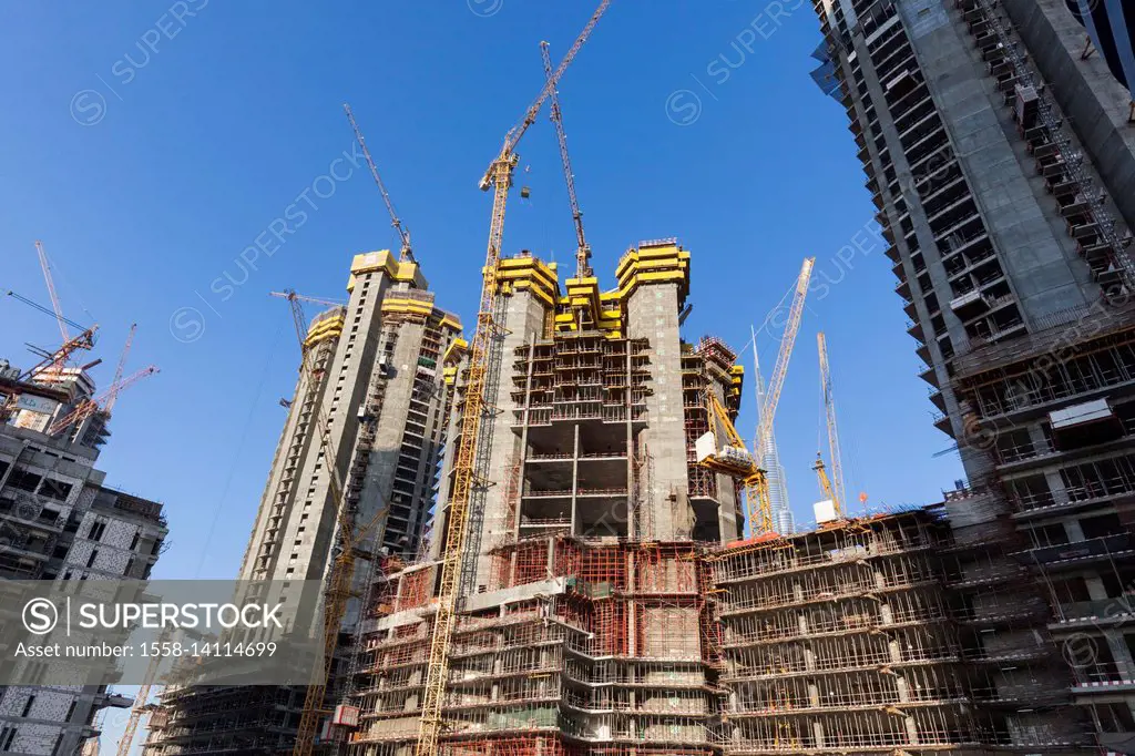 UAE, Dubai, Downtown Dubai, construction cranes