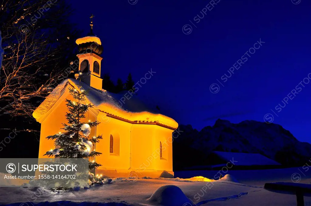 Germany, Bavaria, Isar valley, winter, dusk, chapel, Christmas tree,