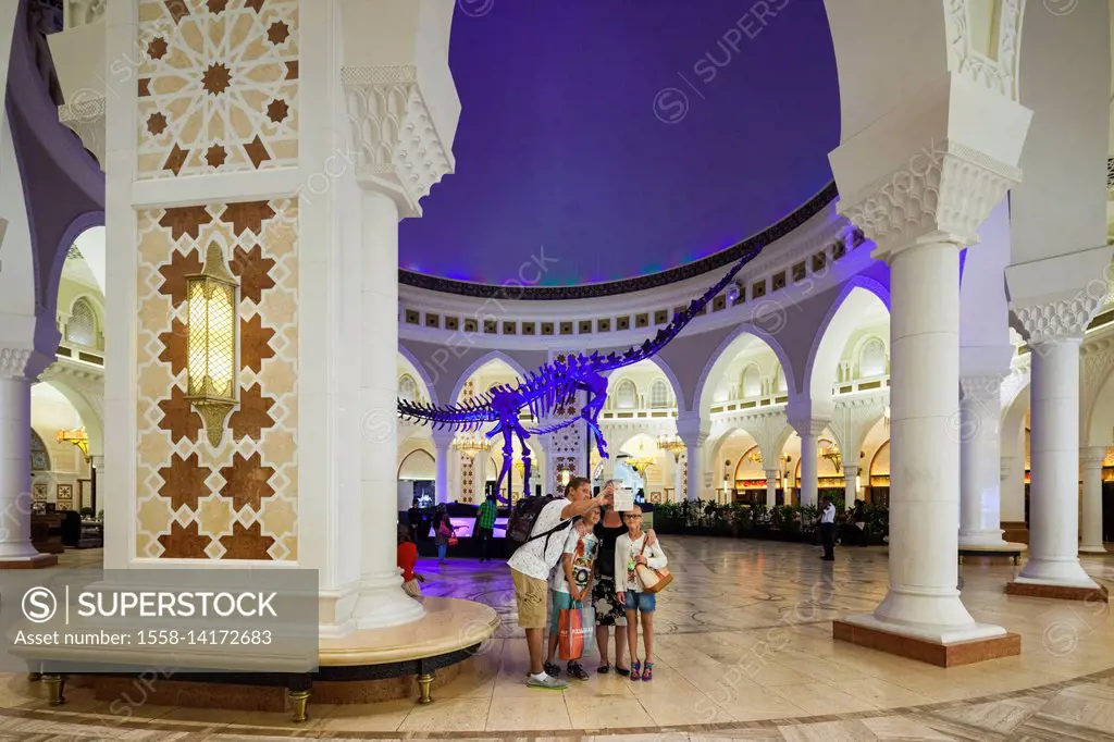 UAE, Dubai, Downtown Dubai, Dubai Mall, interior, Arabic-themed souk area, dinosaur skeleton