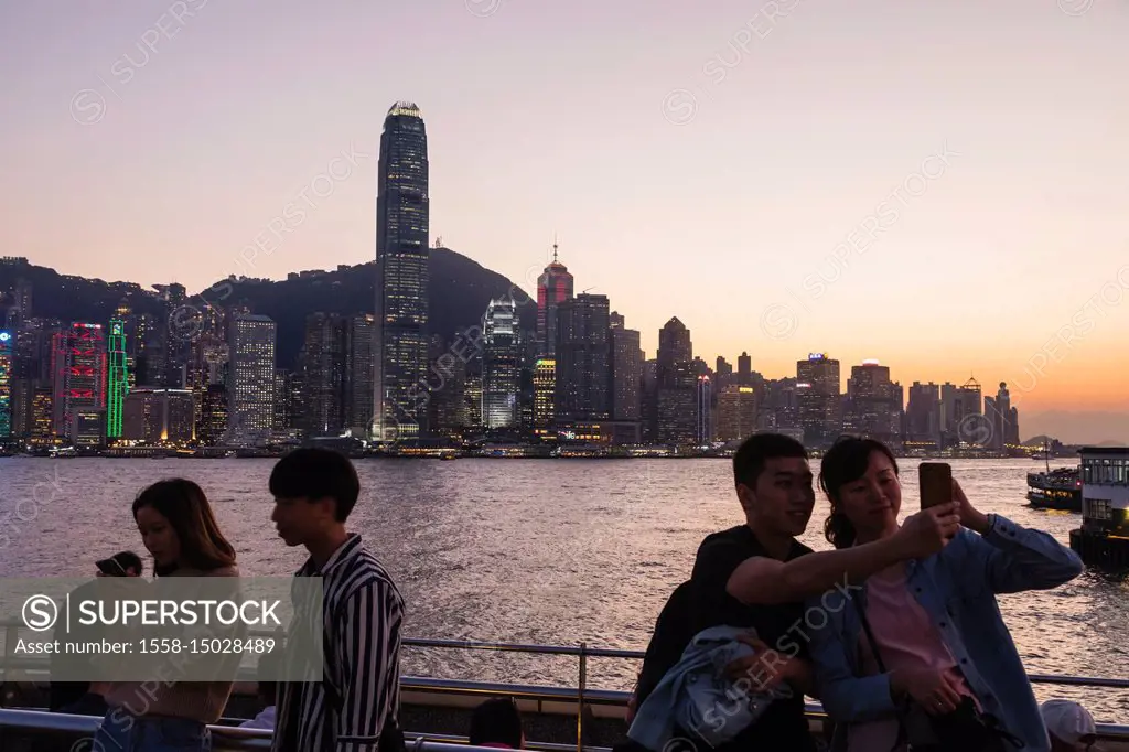 China, Hong Kong, Chinese Tourists and City Skyline