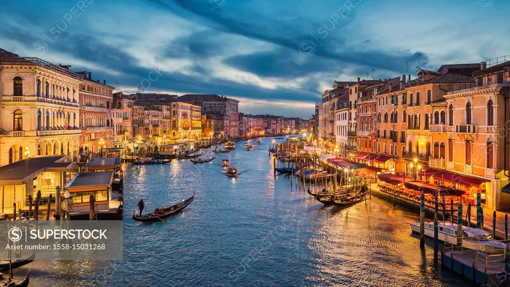 Grand Canal at night with a gondola, Venice, Italy