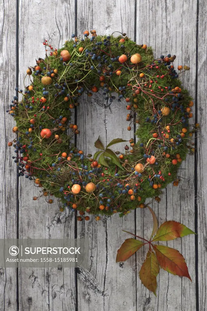 Wreath with wild fruits and berries