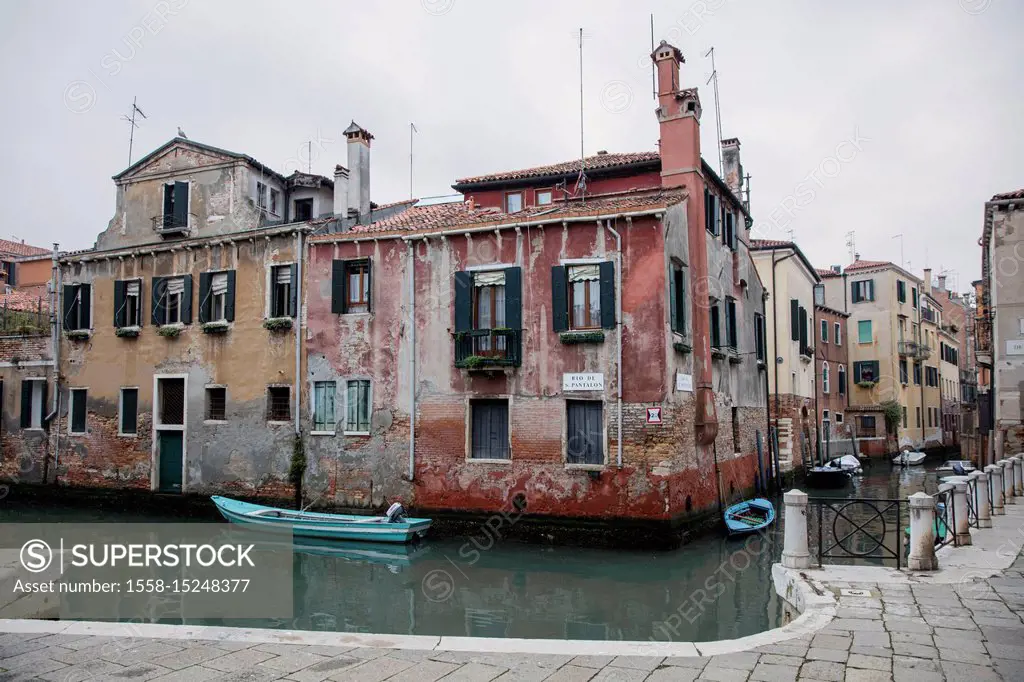 Old house row at canal, Venice, Veneto, Italy