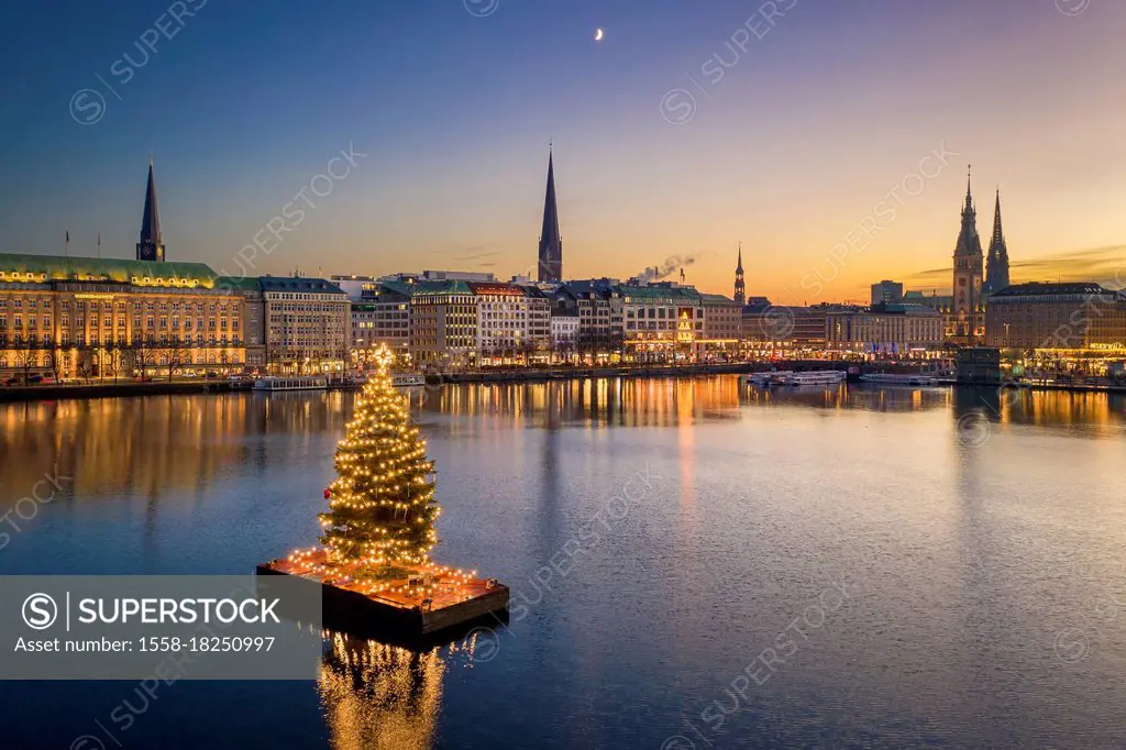 Sunset skyline of Hamburg, Germany with Christmas decorations