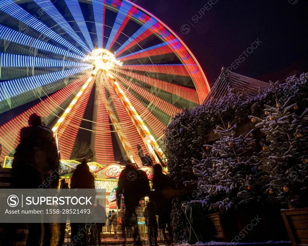 Ferris wheel on the Koberg in Lübeck at Christmas time, Schleswig-Holstein, Germany