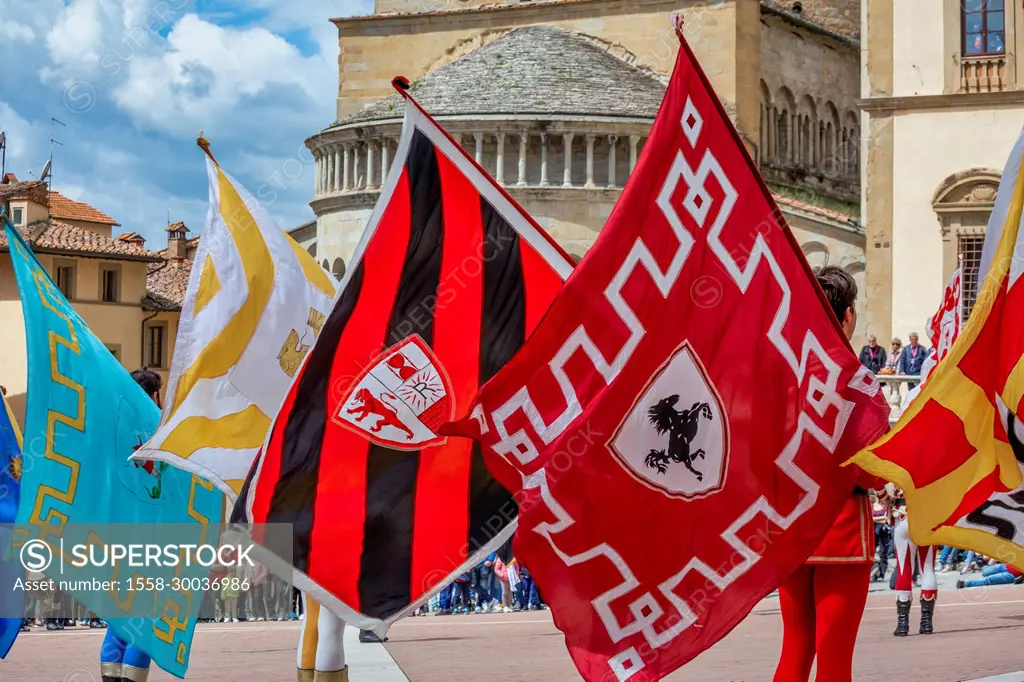 Italy, Tuscany, Arezzo, the Flag-wavers in the Arezzo main square, Piazza Grande crowded of tourists