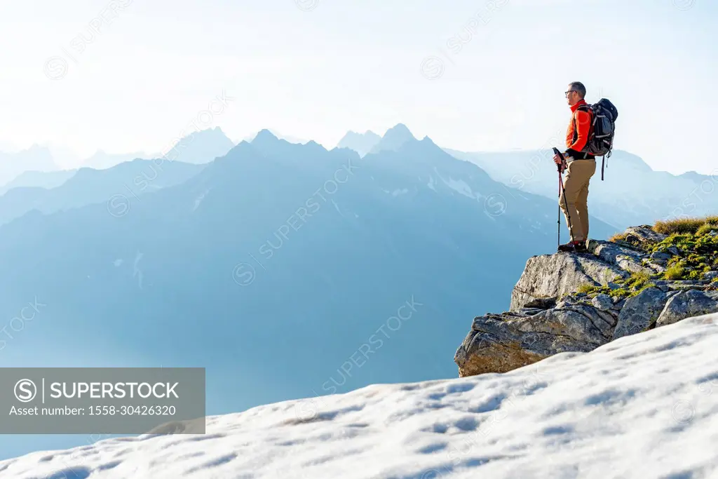 tourist admiring the Austrian peak, Europe, Austria, Zillertal