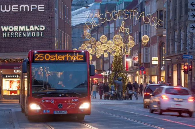 Busam bowl basket with shopping street Sögestrasse with Christmas lighting at dusk, Bremen, Germany, Europe