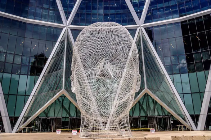 Canada, Alberta, Bow River Valley, Calgary, Downtown, Bow Tower, Wonderland head sculpture by Jaume Plensa
