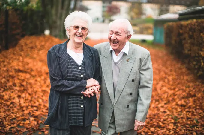 Senior couple in love at autumn walk