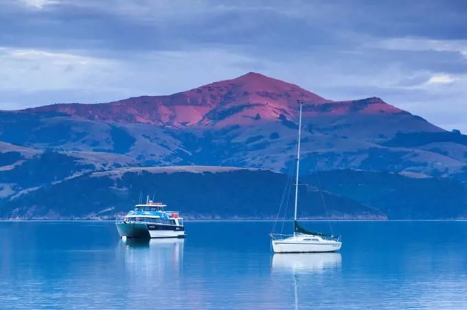 New Zealand, South Island, Canterbury, Banks Peninsula, Akaroa, Akaroa Harbor, dawn