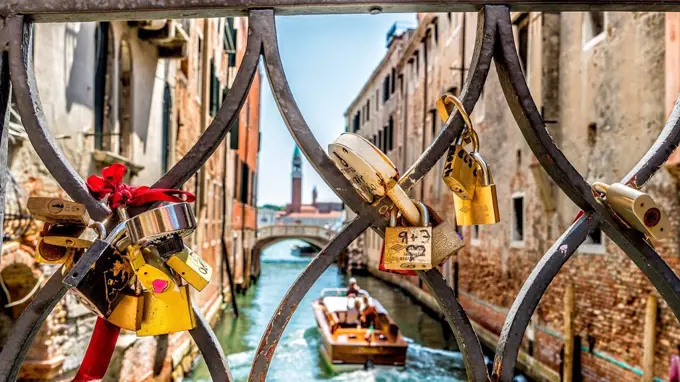 love locks in a balustrade, channel, Boat, Venice, Veneto, Italy