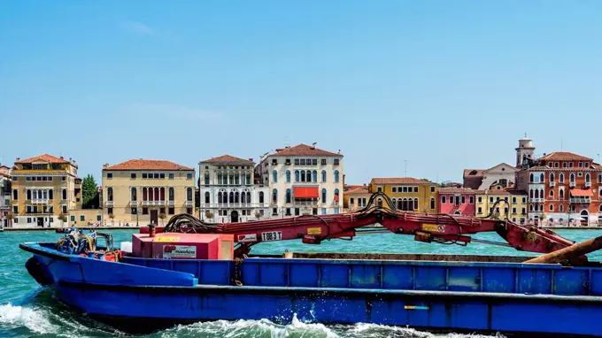 townscape with barge on channel, Venice, Veneto, Italy