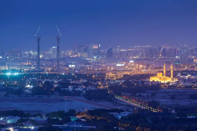 UAE, Dubai, Downtown Dubai, elevated skyline view towards Dubai Creek, dusk