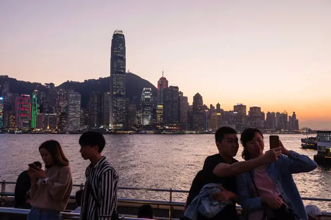 China, Hong Kong, Chinese Tourists and City Skyline