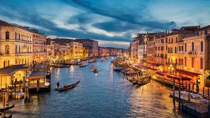 Grand Canal at night with a gondola, Venice, Italy